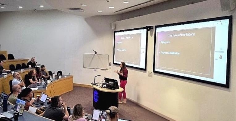 Stephanie Stasey presenting to a lecture theatre audience